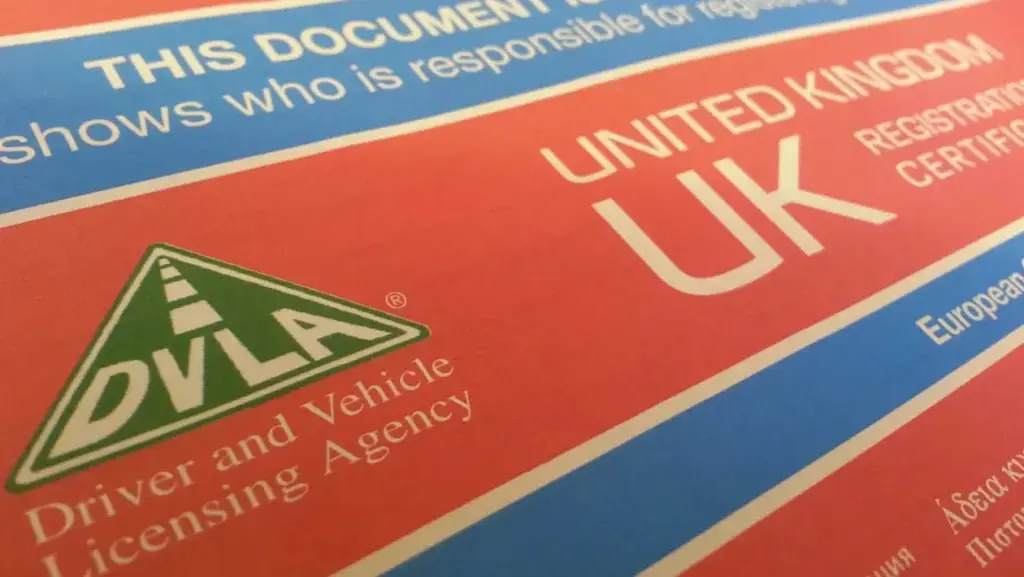 Official UK 5 V Registration Document issued by the DVLA showing vehicle ownership details.