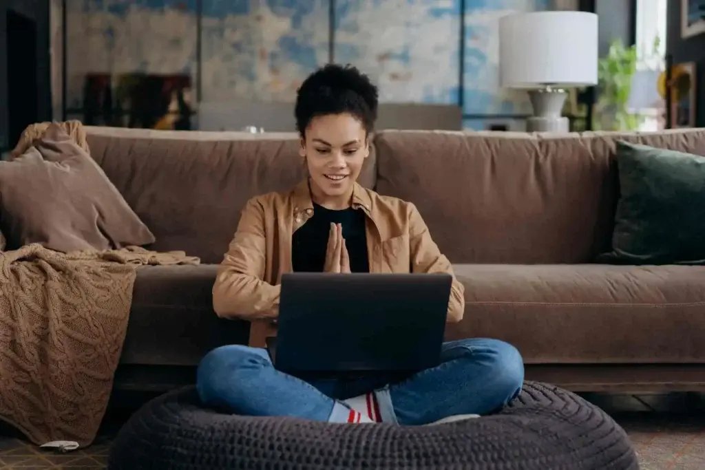 A women happy, using a Laptop