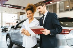 What do I need to sell my car to a dealership for a profit